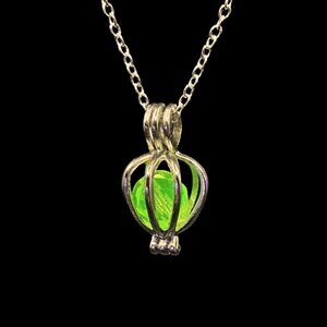 Gold Cage Pendant With Salvaged Vintage Uranium Glass Bead on Gold Chain Glows